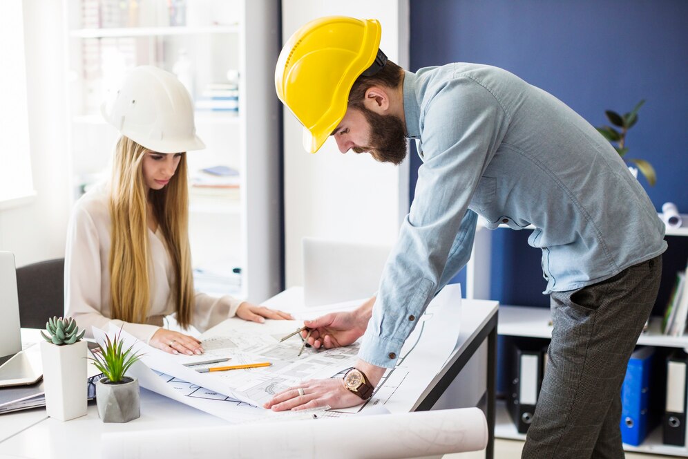 male-engineer-drawing-plan-blue-print-with-architect-equipment_23-2147842986